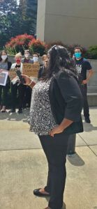 Attorney Andrea Jarmon speaking
